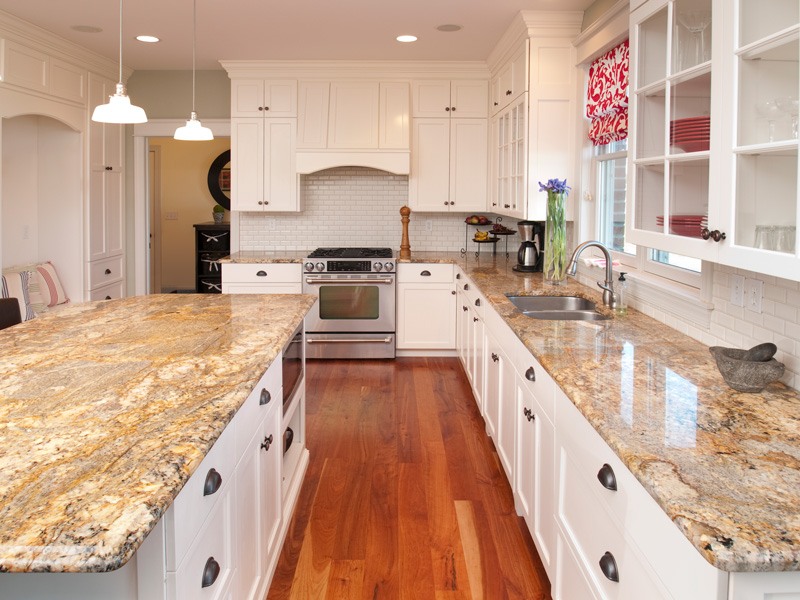 white kitchen cabinets and granite countertops